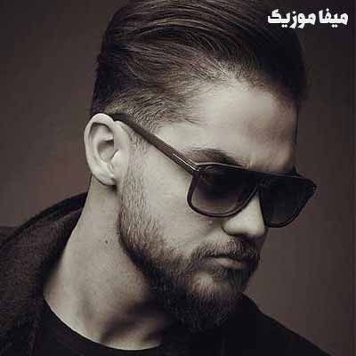 دانلود آهنگ علی خدابنده میزنه میزنه با دل من حرف وقتی میشینه دونه دونه دونه های برف رو موهای مشکی